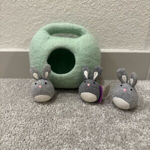 Lovevery bunnies in a felt burrow